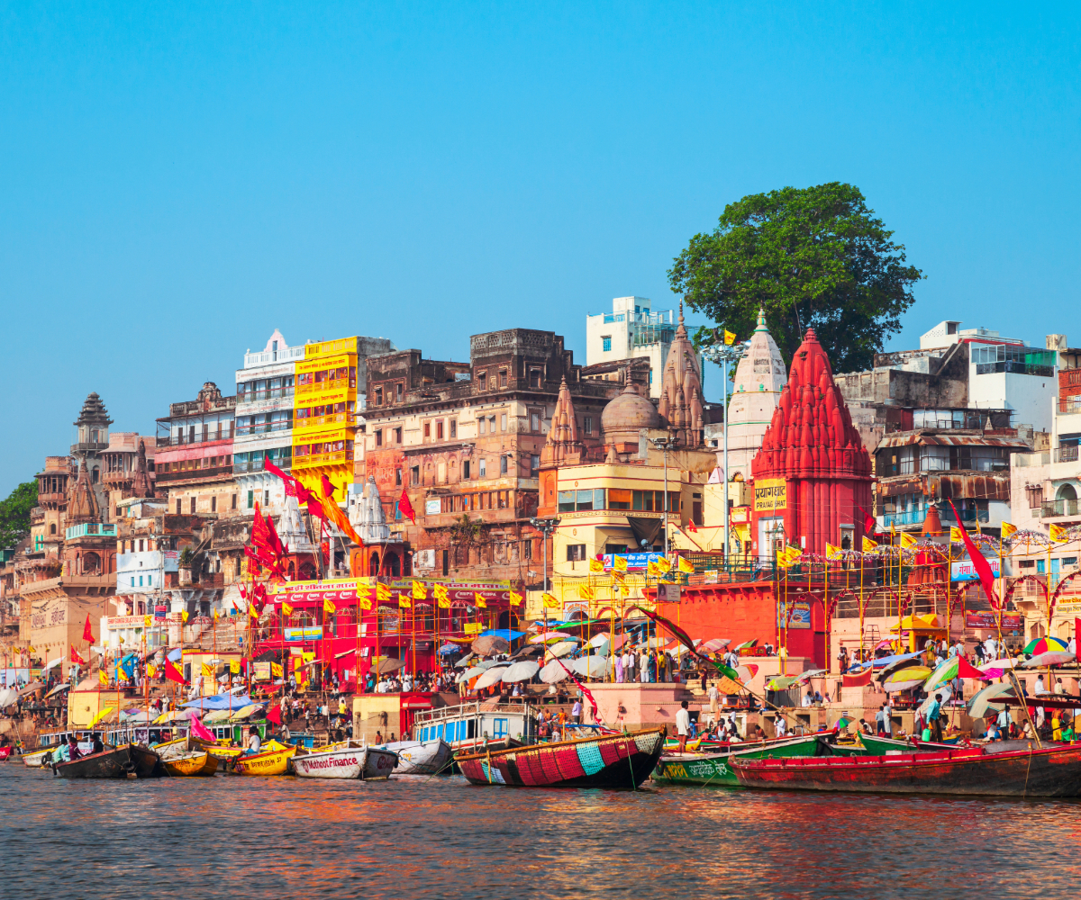 Boat ride on the Ganges with temples in the background, Varanasi